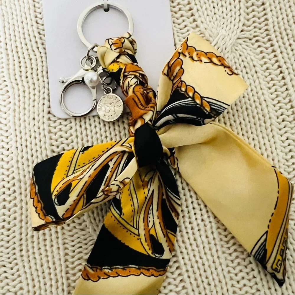 Lulla Collection Women New Bag Charm with Scarf Like Bow Pearl Charm Gold/Black